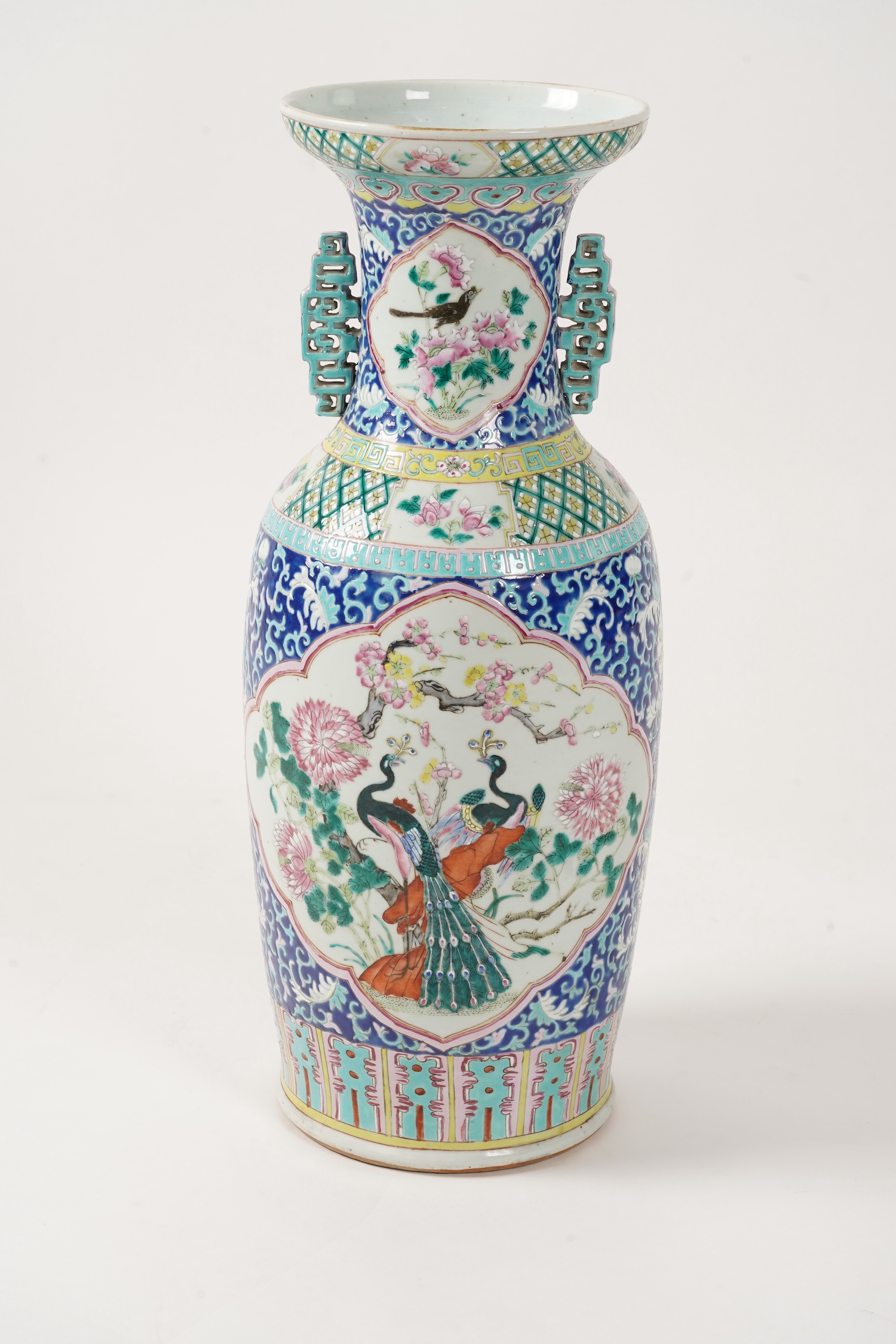 A tall Chinese famille rose ‘phoenix and peacock’ vase, late 19th century